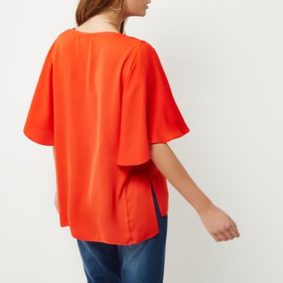Red cape sleeve top